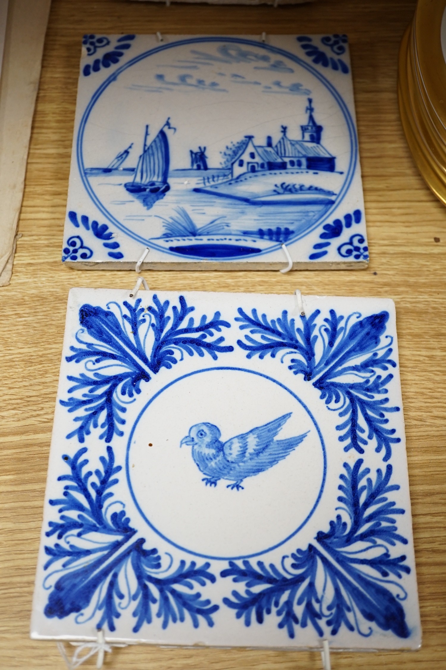 A collection of Delft and other blue and white tiles, 18th century and later (4)